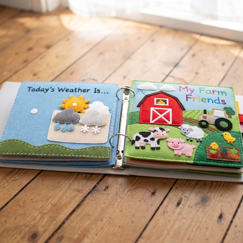 Felt Today's Weather busy book page bound into quiet book alongside farm themed page