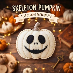 May include: A cream-colored felt pumpkin with a stitched brown stem and a black felt skeleton face featuring oval eyes and a wide, stitched grin. The text SKELETON PUMPKIN FELT SEWING PATTERN PDF is displayed on a banner above the pumpkin.