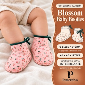 May include: A PDF sewing pattern for Blossom Baby Booties featuring a pink floral print with green leaves, dark green trim, and ribbon ties. The text includes 6 sizes from 0-24M, A4, A0, and Letter formats, and an intermediate skill level.