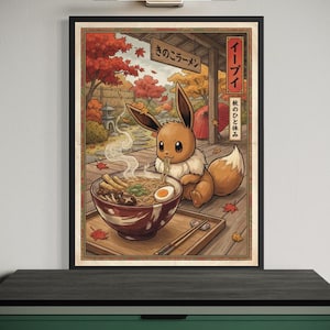 Puede incluir: Una lámina enmarcada que muestra a un personaje Eevee marrón comiendo ramen de un cuenco con vapor. La escena se desarrolla en un porche de madera durante el otoño con hojas de arce rojas, un paraguas rojo y texto en japonés en un cartel.