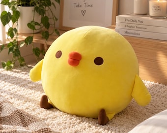 ひよこのぬいぐるみ – 葉っぱの帽子とぶらぶらの脚がかわいい黄色の