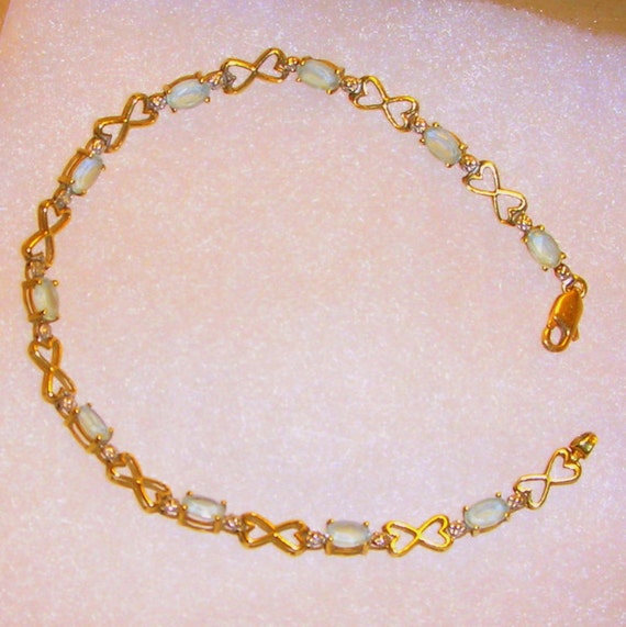 Blue Topaz Tennis Bracelet 7" Yellow Gold 14 K