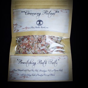 May include: A small, clear plastic bag filled with pink Himalayan salt, Dead Sea salt, and Epsom salts. The bag is labeled "Bewitching Bath Salts" and "Cleansing Ritual".