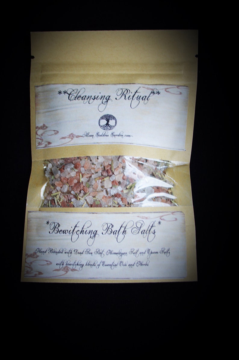 May include: A small, clear plastic bag filled with pink Himalayan salt, Dead Sea salt, and Epsom salts. The bag is labeled "Bewitching Bath Salts" and "Cleansing Ritual".