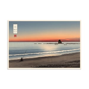 May include: A print depicting a coastal scene at sunset with a lone figure fishing on a sandy beach. The horizon features a rocky outcrop in the ocean under a gradient sky of orange and blue. A vertical white text box with Japanese characters is visible.