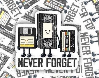 May include: A set of stickers featuring retro technology icons like a floppy disk, VHS tape, and a cassette tape. Each icon has a smiling face and the text "Never Forget" is printed on the stickers.