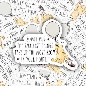 May include: A set of Winnie the Pooh themed stickers with a quote that reads "Sometimes the smallest things take up the most room in your heart."