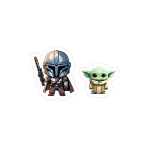 May include: A sticker set featuring a chibi-style armored character in a metallic silver helmet and brown cape holding a blaster, alongside a small green creature with large dark eyes wearing a tan robe, both with white die-cut borders.