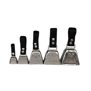 May include: Set of six silver cowbells with black straps. The cowbells are different sizes and are arranged in order from smallest to largest.