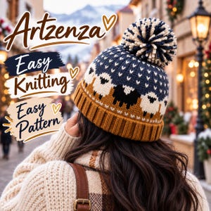 May include: A knit beanie featuring a navy blue, cream, and mustard yellow sheep pattern with a ribbed mustard yellow brim and a large navy and cream pom-pom on top. The text Artzenza, Easy Knitting, and Easy Pattern is visible on the left side.