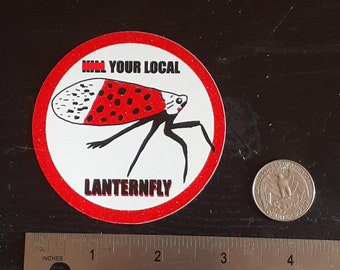 May include: A red and white sticker with a black outline and the text "Kill Your Local Lanternfly". The sticker features a black and white illustration of a spotted lanternfly.