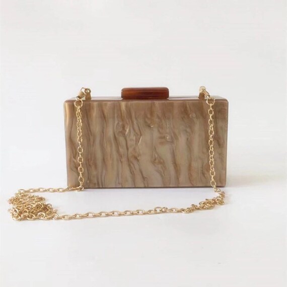 plain gold clutch bag
