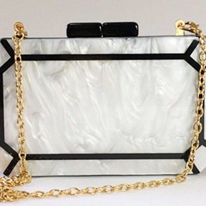 White pearlescent and black two tone acrylic clutch with the gold metal chain, Geometric pattern acrylic clutch, Evening clutch