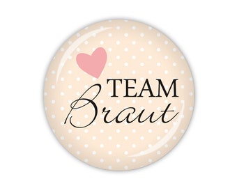 I DO Team Braut mit Herz, apricot (Art. HZ01-02) als Button, Magnet, Taschenspiegel oder Flaschenöffner erhältlich