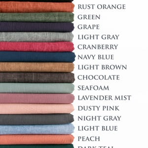 May include: A stack of folded fabric samples in various colors, including Cadet Gray, Olive Green, White, Black, Rust Orange, and more. Each color is labeled with its name in a clean, sans-serif font.