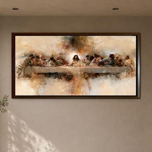 May include: A rectangular wall art print depicting a stylised, impressionistic version of The Last Supper. The artwork features a central figure surrounded by twelve individuals at a long table, rendered in muted earth tones, browns, and creams.