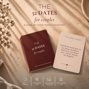 May include: A deck of cards titled THE 52 DATES for couples with a deep red cover and a single cream-colored card featuring the text THE SUNSET CHASER and instructions to find a sunset spot, bring a drink, leave phones away, and watch the sun.
