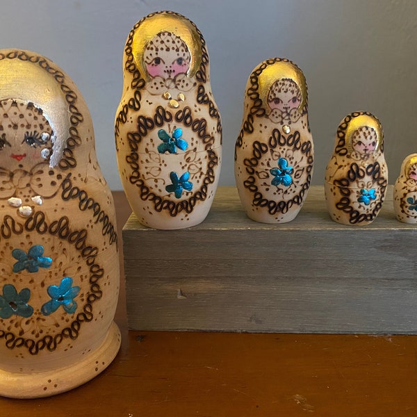 Russian nesting wood dolls Matryoshka, set of five stacking dolls