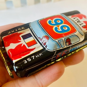Vintage tin Japanese toy car made in Japan 1950s