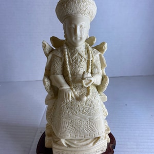 Vintage Asian decor ,ivory carved resin emperor on wood base