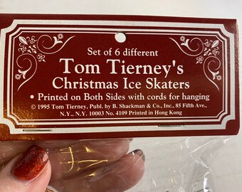 die cut embossed Shackman ice skaters Vintage Christmas ornaments ice skating ornaments