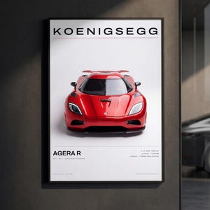 May include: A framed poster featuring a red Koenigsegg Agera R sports car centered on a white background. The text KOENIGSEGG appears at the top, with AGERA R and technical specifications including 1,140 HP and 1,330 KG printed at the bottom.