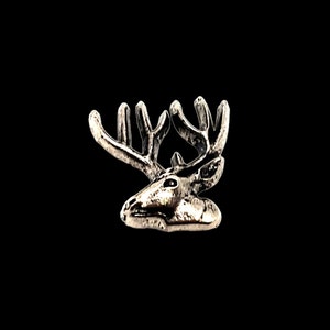 May include: A silver-toned deer head charm with detailed antlers.
