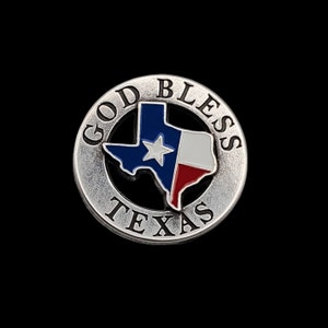 May include: Silver-colored round pin with the words "God Bless Texas" around the edge. The center of the pin features a black outline of the state of Texas with the Texas flag colors inside.