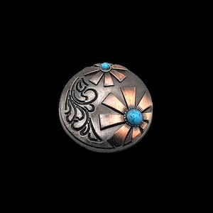 May include: A silver and copper colored metal button with a turquoise stone in the center of a flower design. The button has a floral pattern around the edge.