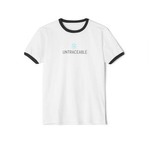 May include: A white ringer t-shirt with black trim on the crew neckline and short sleeves. The centre of the chest features a small light blue graphic of a smiling face icon above the text UNTRACEABLE printed in a simple black sans-serif font.