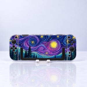 May include: A handheld gaming console featuring a protective skin with a vibrant Starry Night inspired art print. The design displays swirling purple and blue skies, a bright yellow moon, and dark silhouettes of pine trees across the front.