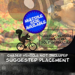 May include: A white tumbler with a black silhouette of a squirrel riding a bicycle. The tumbler is on a gray surface with a laptop and a leafy background. The text "SOLD SEPARATELY" is on the laptop. The text "MULTIPLE SIZE AVAILABLE" is on a blue circle. The text "CHASED" VEHICLE GOES HERE! SOLD SEPARATELY" is on a white rectangle. The text "CHASED VEHICLE NOT INCLUDED SUGGESTED PLACEMENT" is on a white rectangle.