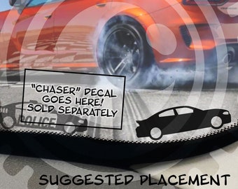 May include: A red Dodge Charger with black accents is shown in a rear view, with the car doing a burnout. The car is in front of a desert landscape. The image is a suggested placement for a decal that says "CHASER" DECAL GOES HERE! SOLD SEPARATELY. The image also includes the text "THE BEST MICRO DECALS IN THE SYSTEM" and "CLOTHED EYE".