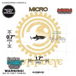 May include: A black shark silhouette graphic on a grid background with text reading MICRO, ANIMALS COLLECTION, Easter EggXACT, and WARNING! MAY BE HABIT FORMING. The graphic measures approximately 0.7 inches in height and 1.7 inches in width.