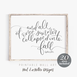 May include: Printable wall art featuring a quote by Oscar Wilde: "And all at once summer collapsed into fall". The quote is written in a cursive font and is framed in a white frame.