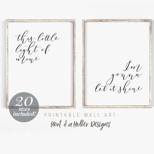Puede incluir: Dos impresiones de arte de pared imprimibles con fondos blancos y texto en caligrafía negra. La impresión de la izquierda dice "this little light of mine". La impresión de la derecha dice "I'm gonna let it shine".
