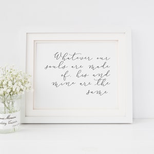 May include: A white framed print with a black calligraphy quote that reads "Whatever our souls are made of, his and mine are the same."