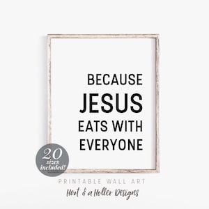 May include: Printable wall art featuring the text "BECAUSE JESUS EATS WITH EVERYONE". The text is in black against a white background. The art is framed in a light wood frame.
