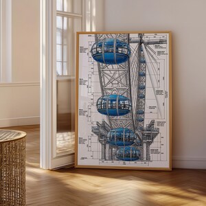 May include: A framed technical blueprint print featuring the London Eye observation wheel. The artwork displays detailed structural line drawings of the steel framework and several prominent blue passenger capsules with technical annotations.