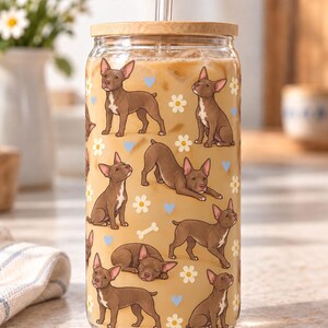 Example of a chocolate dog full-body pattern repeated around a clear glass with ivory flowers and blue hearts.