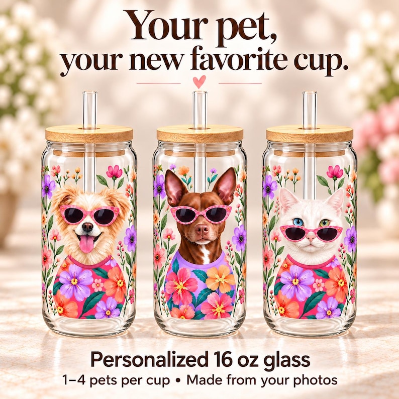 Three examples of a personalized 16 oz floral pet glass with bamboo lid and straw, showing two dogs and a white cat. Customize one cup with 1 to 4 pets.