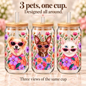 Three views of one glass showing a cream dog, a brown dog, and a white cat spaced around the floral wraparound design.