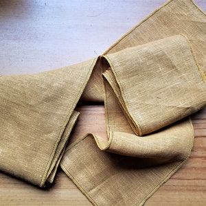 Set aus zwei Beinwickel aus hellem Leinen