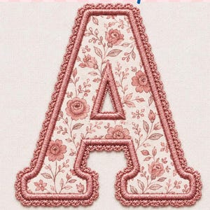 May include: An embroidered letter A featuring a dusty rose floral pattern on a cream background, outlined with a scalloped border. The text Embroidery Club appears at the top, and the file formats PES, DST, JEF, VP3, EXP are listed below.