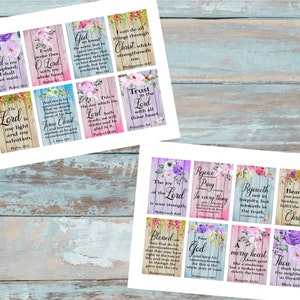 May include: Two sheets of paper with multiple small, rectangular cards featuring floral designs and Bible verses. The cards have a rustic wood-like background with various colours and text such as "The Lord is my shepherd, I shall not want."