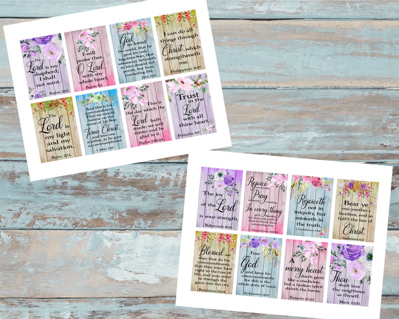 May include: Two sheets of paper with multiple small, rectangular cards featuring floral designs and Bible verses. The cards have a rustic wood-like background with various colours and text such as "The Lord is my shepherd, I shall not want."