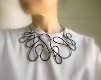 Abstract Black Leather Bib Necklace: Contemporary Silver Accent Choker