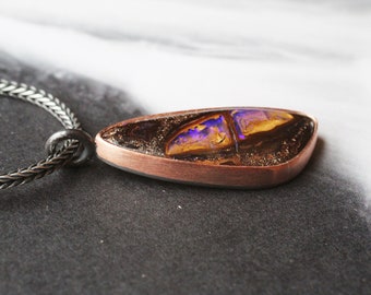 boulder opal necklace | raw copper and recycled sterling silver open back bezel | violet on brown koroit cabochon wing