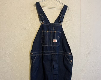 Salopette vintage Round House realizzata in denim blu scuro USA 48 x 29