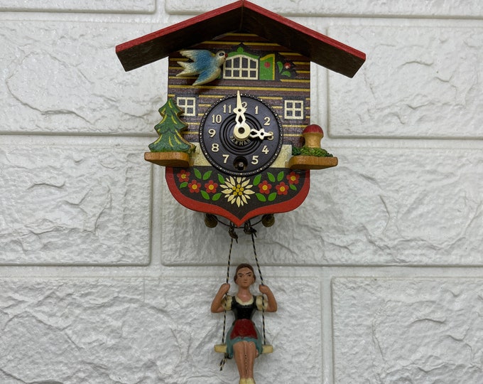 Vintage Miniature Cuckoo Clock With Girl on a Bouncy Swing . Germany